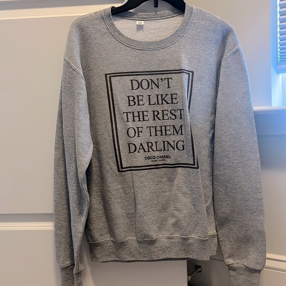 Grey sweatshirt with Coco Chanel quote